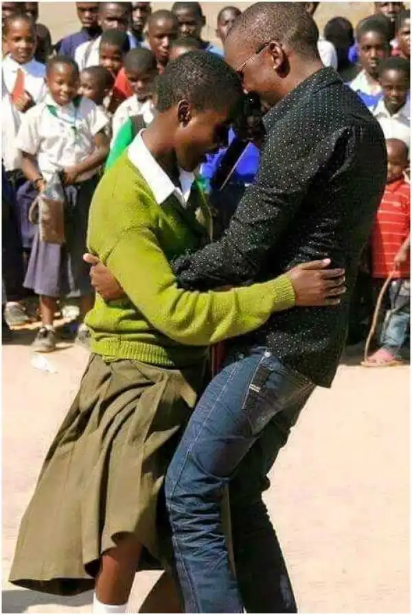 Photo Of An MC Dancing With A School Pupil At Event Sparks Outrage
